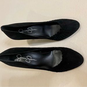 Black shade heels with gathering at top.